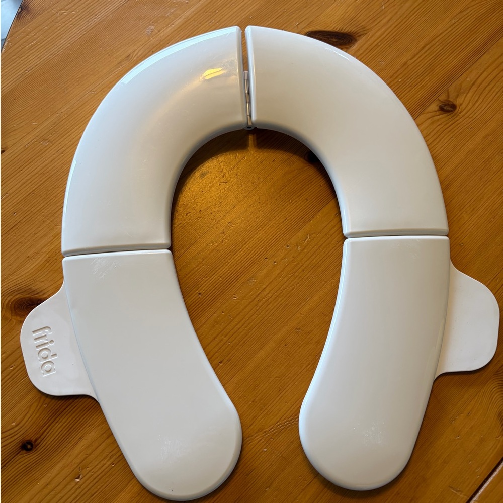 Frida Baby Fold-and-Go Portable Potty Seat for Toilet